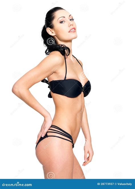 Carrocería Delgada De La Mujer Joven En Bikini Negro Fotografía de