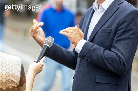 Journalist Making Media Interview With Unrecognizable Person Vox