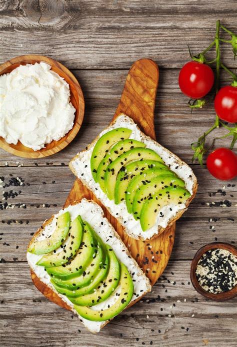 Toasts With Creamy Cheese And Avocado For Healthy Snack Or Breakfast