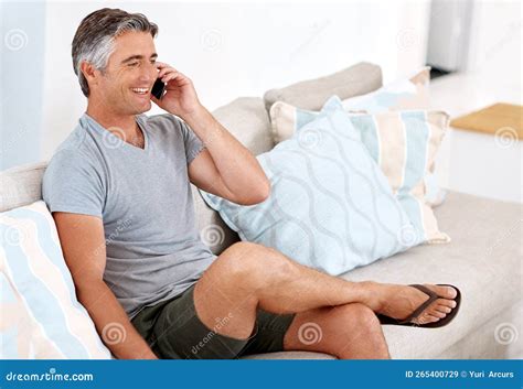 This Is The Best Time To Catch Up With People A Handsome Mature Man Sitting On His Living Room