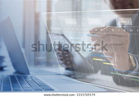 Project Management Project Manager Updating Tasks Stock Photo ... 