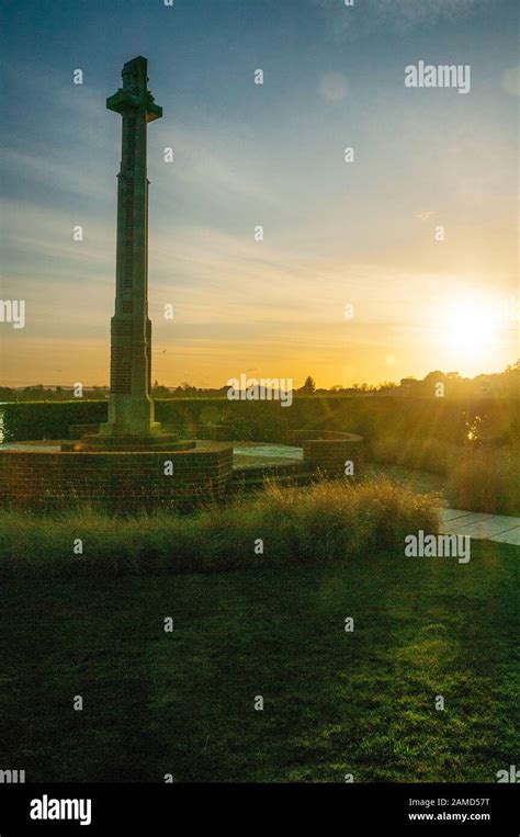 Sun Setting Behind The Memorial For The First World War In Poole Park