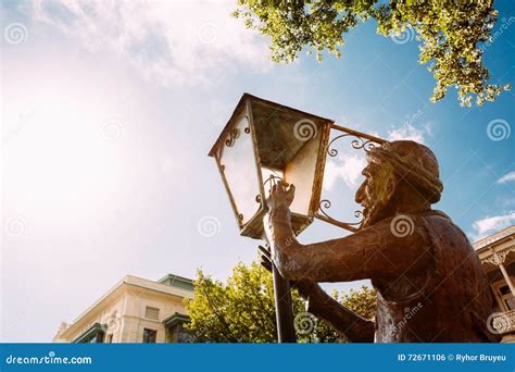 Statue Of Old Lamplighter Igniting Lights On Streets Of Tbilisi