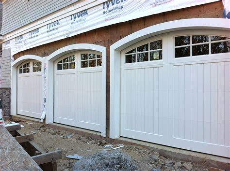 Custom wood garage doors with custom arches | AJ Garage Door - Long Island NY