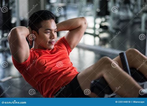 Asian Muscular Strong Active Man Tdoing Thai Boxing In A Park Royalty