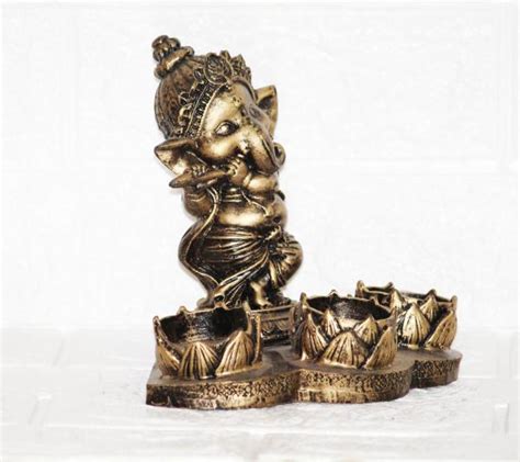 Beckon Venture Handcraft Lord Ganesh Ji With Candle Showpiece For