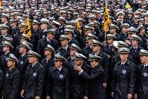 Navy Midshipmen at football game on Behance