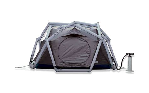 An Inflatable Tent Is Set Up With The Door Open To Allow People To Use It