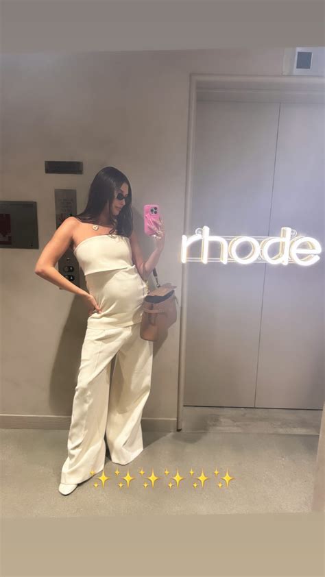 Hailey Bieber Shares New Photos Of Growing Baby Bump At Rhode