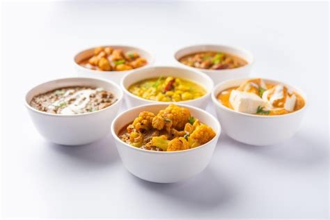 Premium Photo | Group of Indian vegetarian dishes hot and spicy Punjabi ...