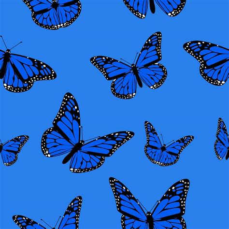 Seamless Pattern Of Blue Butterflies On A Blue Background Vector Image