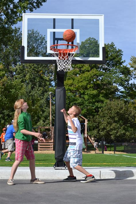 This closer front shot shows students playing on the new Pro Dunk Gold ...