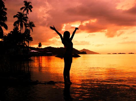 Silhouette Ow Woman Standing On Water During Sunset Hd Wallpaper