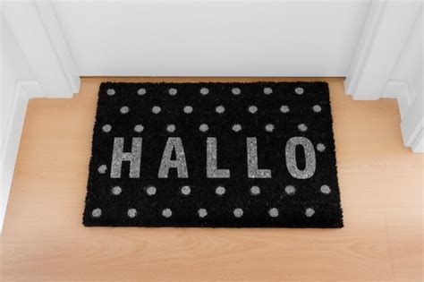 Premium Photo | Welcome home doormat with close door