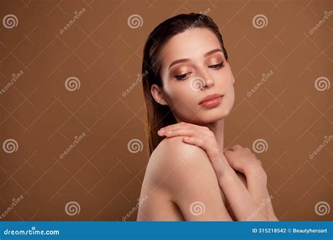 Photo Of Pretty Shiny Woman Nude Shoulders Cuddling Herself Empty Space