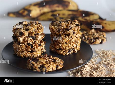 Healthy Evening Snacks Made Of Rolled Oats Pureed Ripe Plantains And Raisins Shot On White