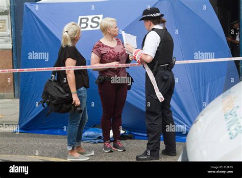 Notting Hill London UK 28th August 2015 A Police Officer Takes A