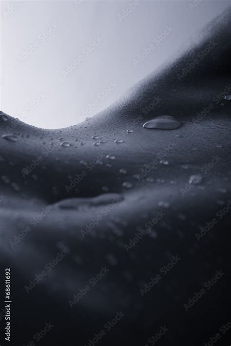 Bodyscape Of A Nude Woman With Wet Stomach And Back Lighting Art Stock