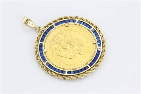 Large 1923 Gold Angel Coin Pendant Set In A Custom Sapphire Gold Bezel at 1stdibs