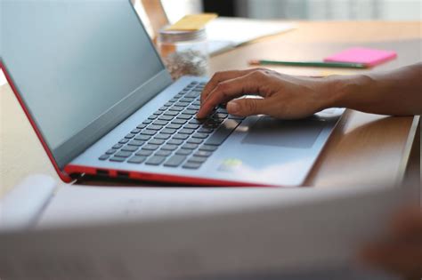 Person working on laptop 1960644 Stock Photo at Vecteezy