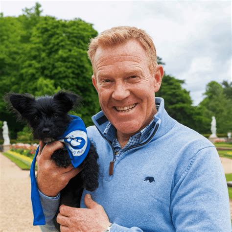 Adam Henson Holding A Dog On An Agria Dog Walk Agria Pet Insurance