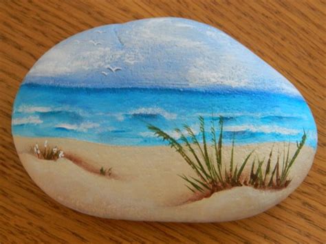 Unique Pebble Art Painted Rock On A Wooden Table