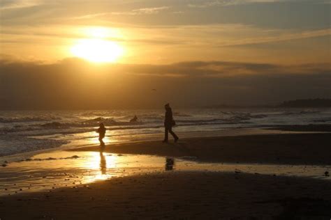 Free Images Man Beach Sea Coast Water Sand Rock Ocean Walking People Sky Girl