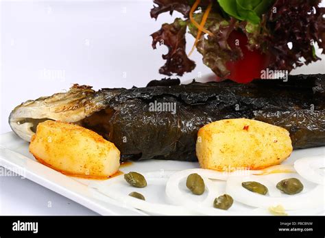 Grilled fish with vegetables Stock Photo - Alamy