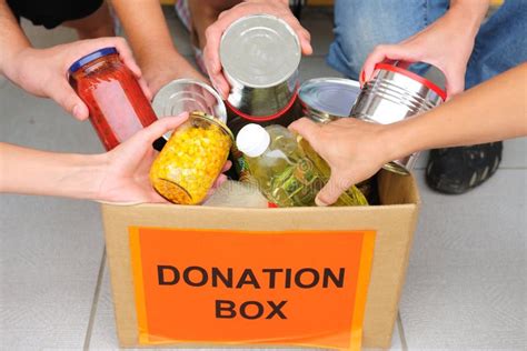 Volunteers Putting Food In Donation Box Stock Image Image Of