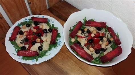 Insalata Di Bresaola Pomodori Rucola Parmigiano E Crostini