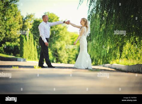 Just Married Couple Walking In Love Stock Photo Alamy