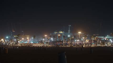 Night view of city beach, industrial cranes and concert lights 28576858 ...