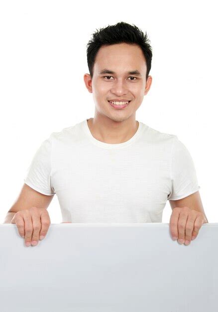 Homem Segurando Um Cartaz Em Branco Foto Premium