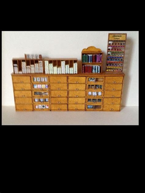 A Wooden Cabinet Filled With Lots Of Drawers