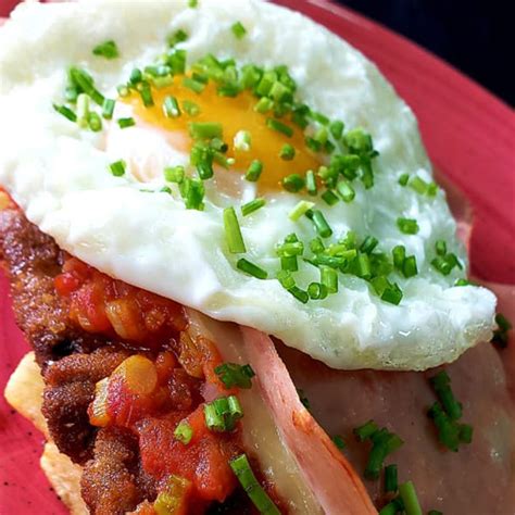 MILANESA NAPOLITANA CON PAPAS FRITAS Gato Dumas Barranquilla