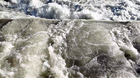 Close Up To The River Swollen After Heavy Rainfall And Flood Water