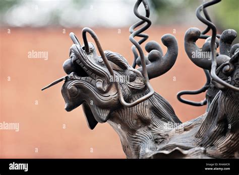 Dragon sculpture in a temple in Hanoi, Vietnam Stock Photo - Alamy