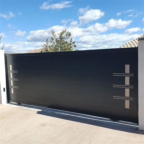 Swing gate - MOTIFS ALUNOX® - La Toulousaine - sliding / aluminum