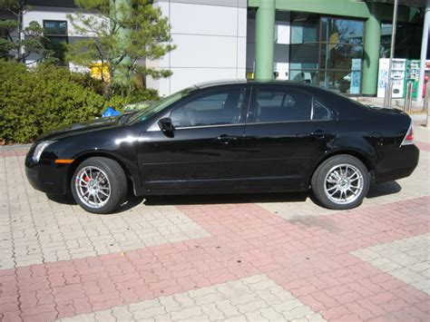 Ford Fusion Custom Wheels OZ 17x8 0 ET Tire Size 225 50 R17 X ET