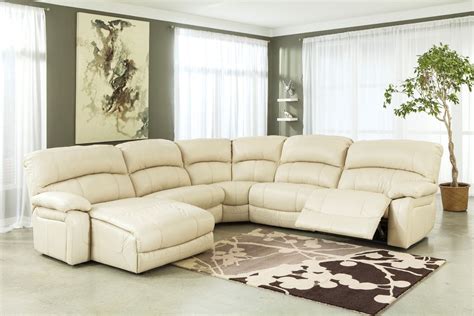 Small Cream Leather Sofas For Cozy And Elegant Small Living Space