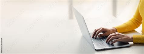 Person typing on laptop keyboard, businessman working on laptop, he is ...