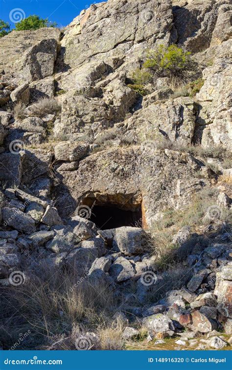 Cave Of An Old Mine Excavated In The Naked Rock Stock Photo Image Of