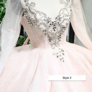 Light Nude Pink Beaded Bodice Long Sleeves Sparkle Ball Gown Wedding Dress With Short Train
