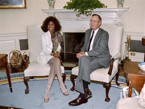 U S President George H Bush And Whitney Houston In The Oval Office Of