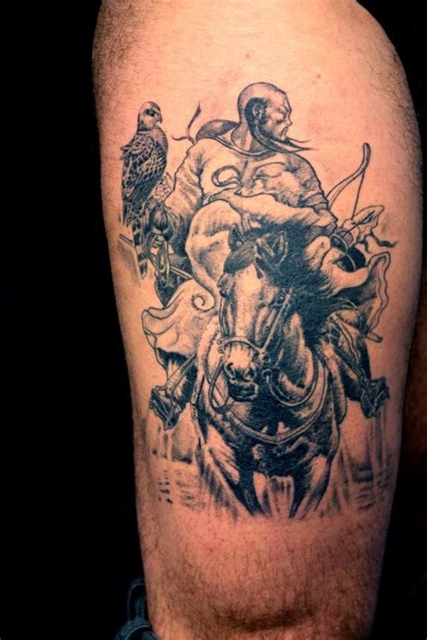 Mongolian warrior on horseback with a bird tattoo on thigh ...