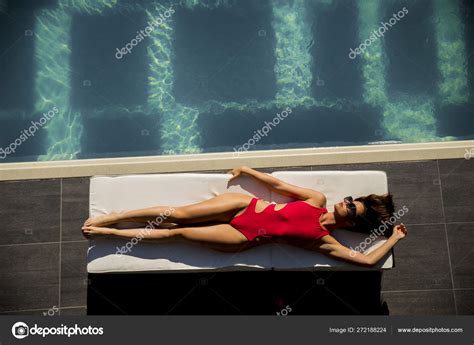 View Beautiful Tanned Woman Sunglasses Red Bikini Relaxing Luxury Swimming Stock Photo