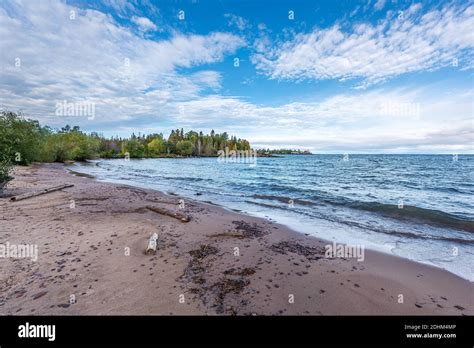 Eagle Harbor Lighthouse On The Shore Of Lake Superior In The Upper