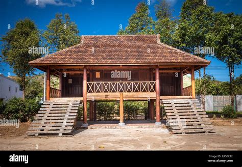 A traditional stilt building that is a communal house for people from the Brau ethnic minority ...