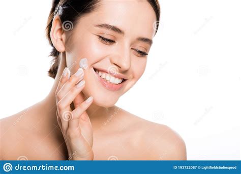 Naked Brunette Woman Applying Face Cream Isolated On White Stock Image Image Of Pampering