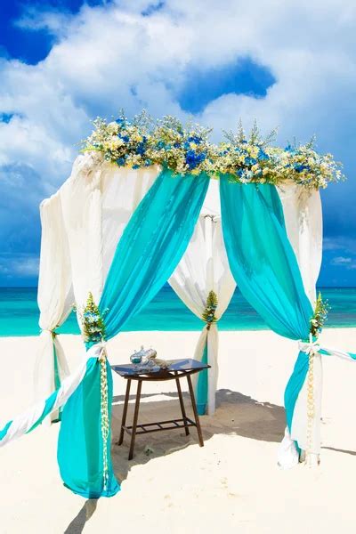 Wedding Arch Decorated With Flowers On Tropical Sand Beach Outd Stock